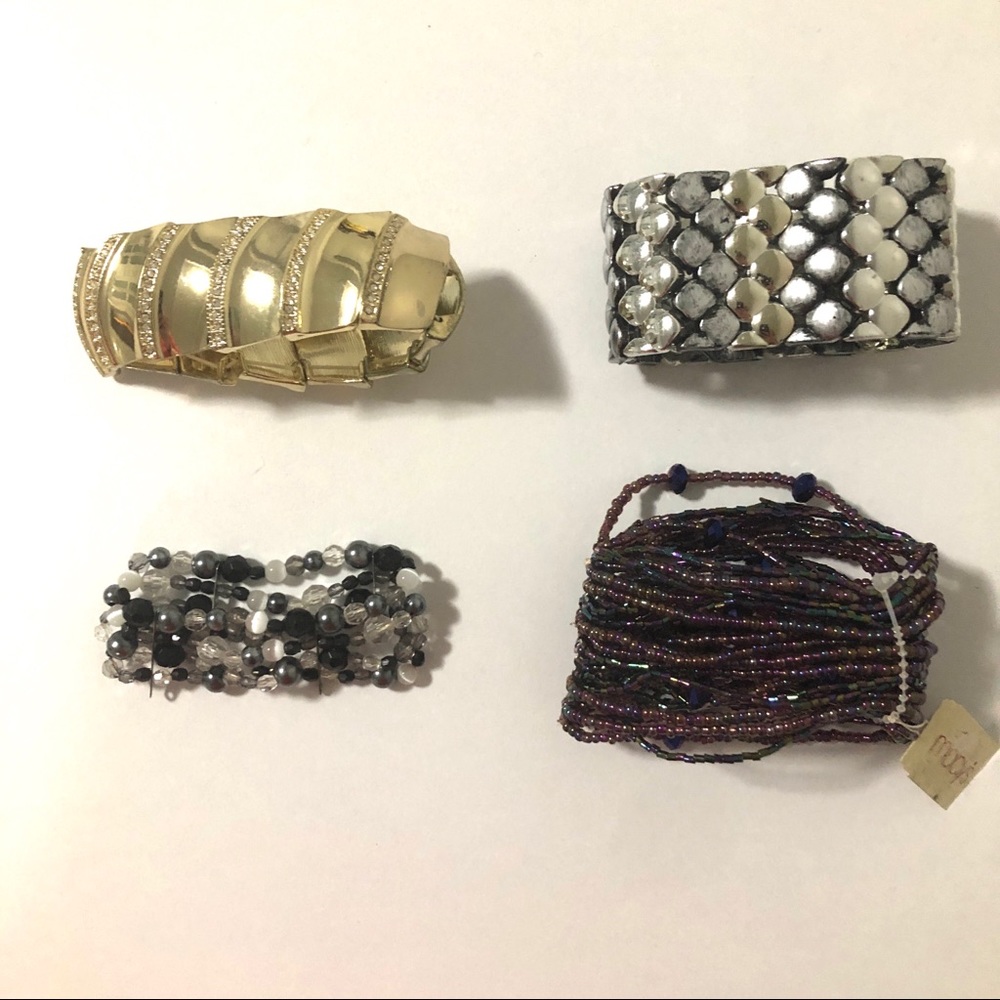 Four Cuff Bracelets - image 1